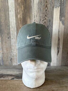 Nike Heritage86 Washed Golf Hat in a faded or washed green colorway,